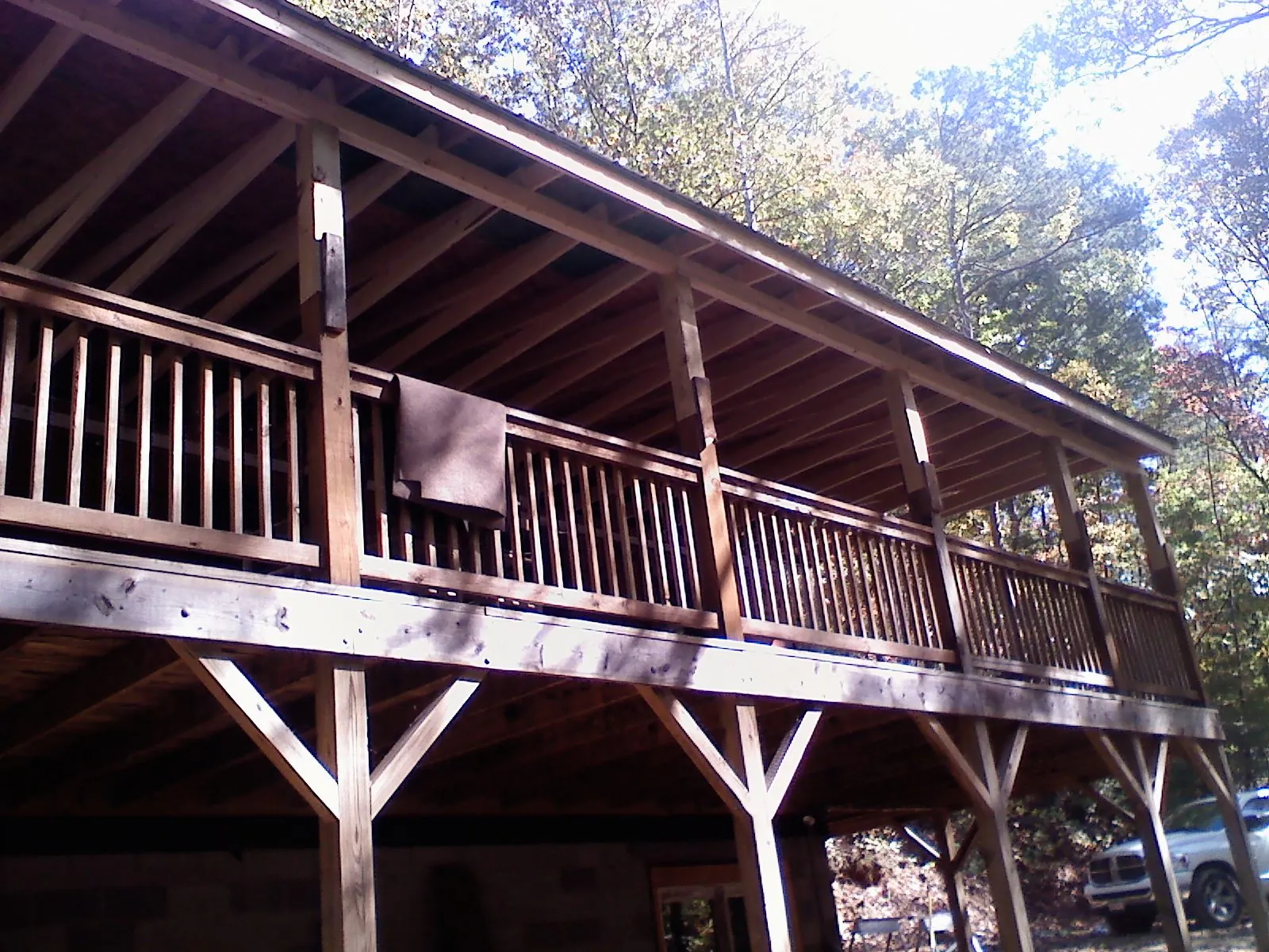 Timber framing under a new elevated porch and deck — Roof Leak Repair in Cedar Crest by Roofing Brothers